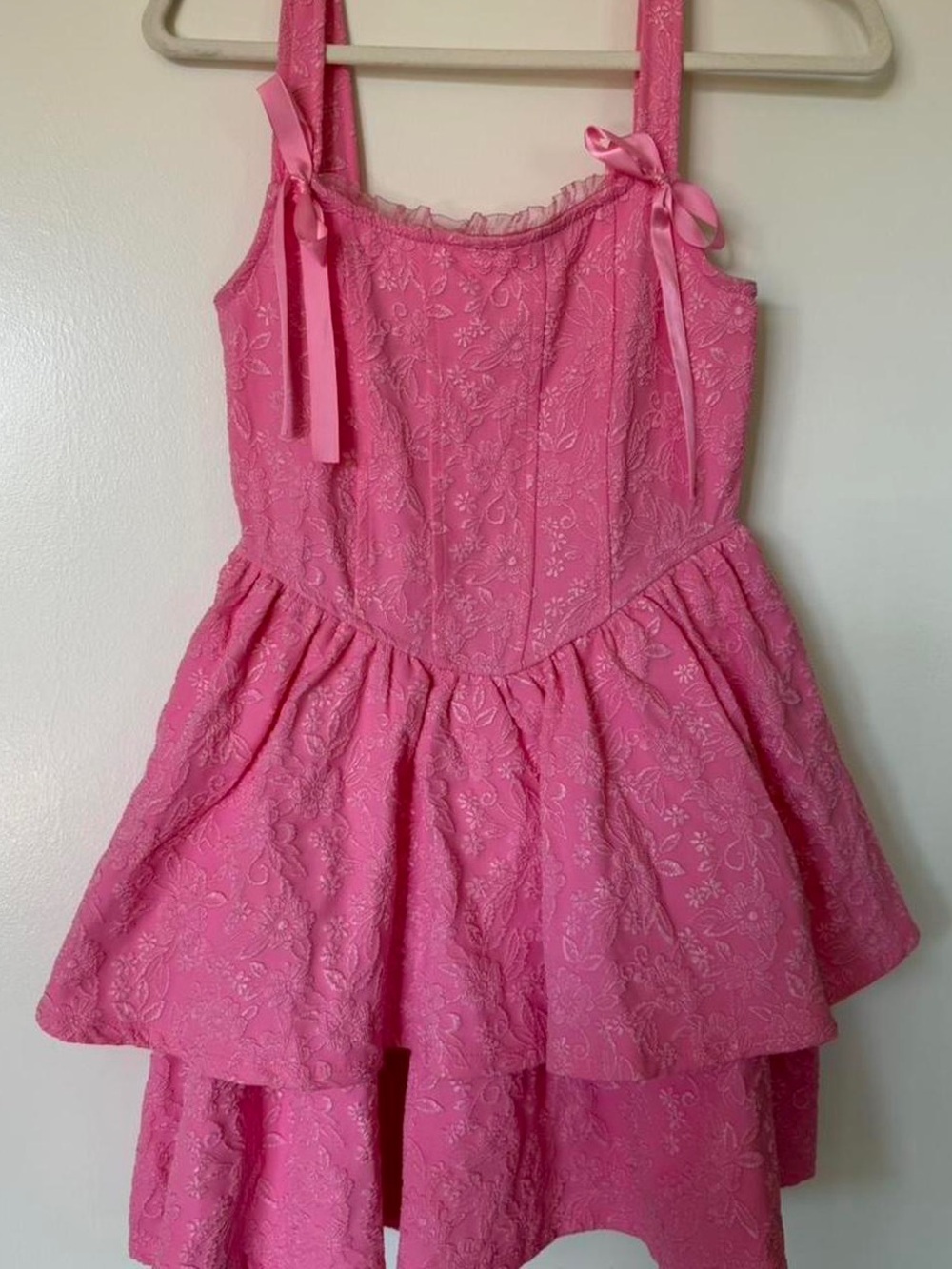 Pink floral dress with bow detail from Francesca’s